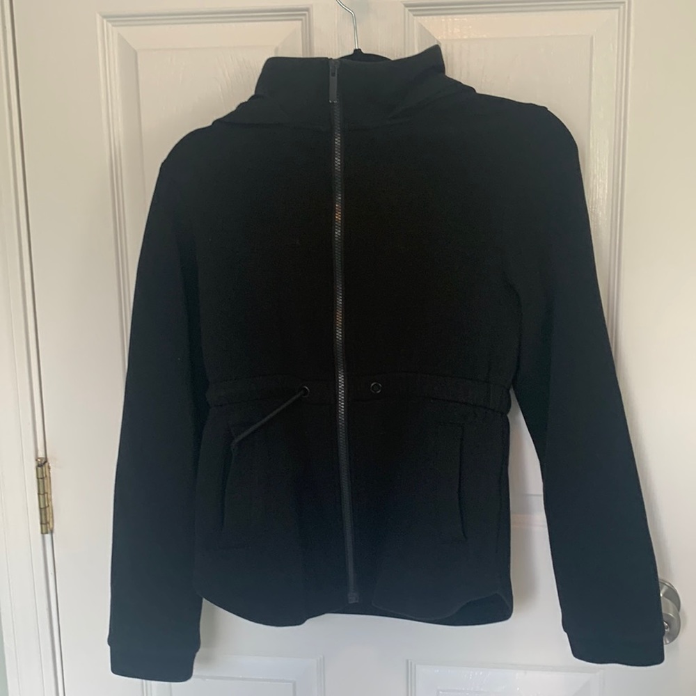 Cute Varley zip up size small with hood and drawstring to cinch waistline.